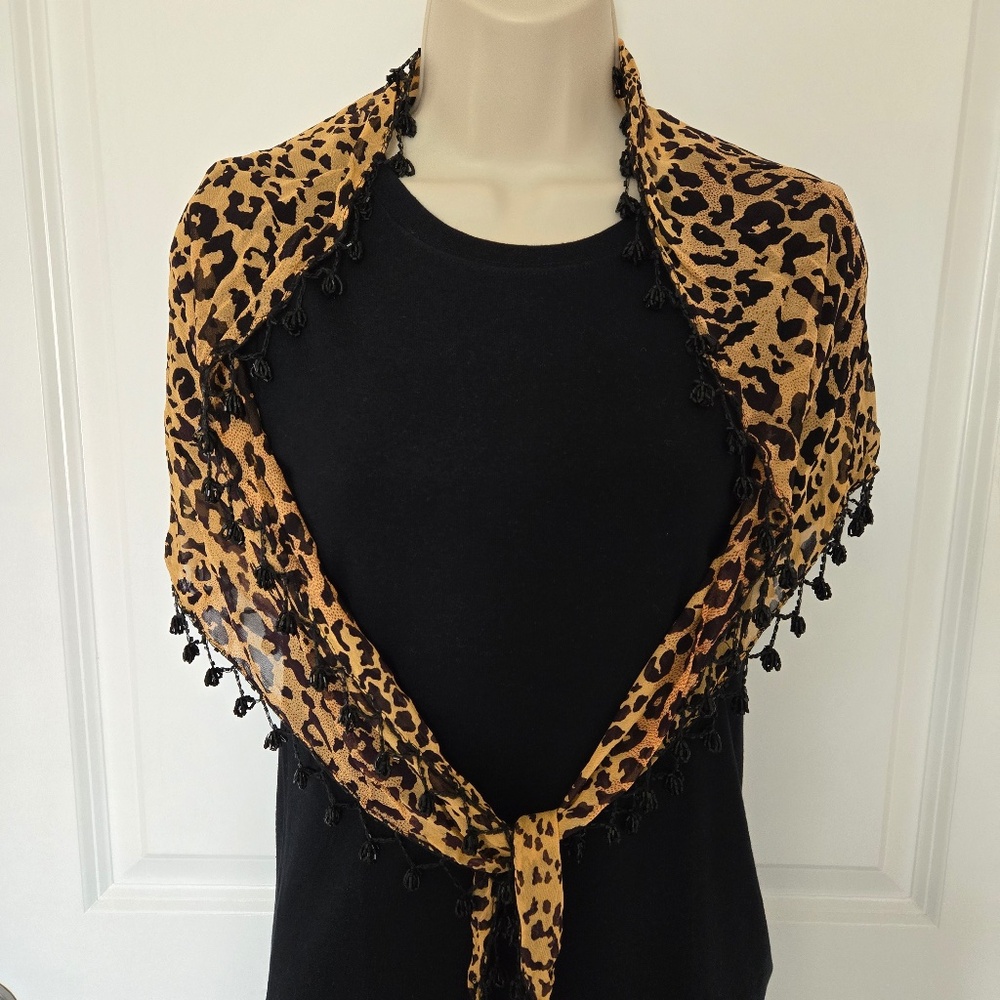 Womens leopard shoulder wrap.